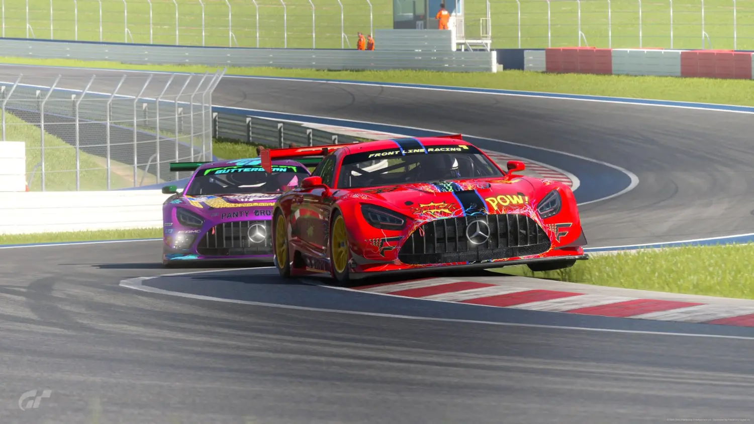 Team Menace red GT race car attacking a curb